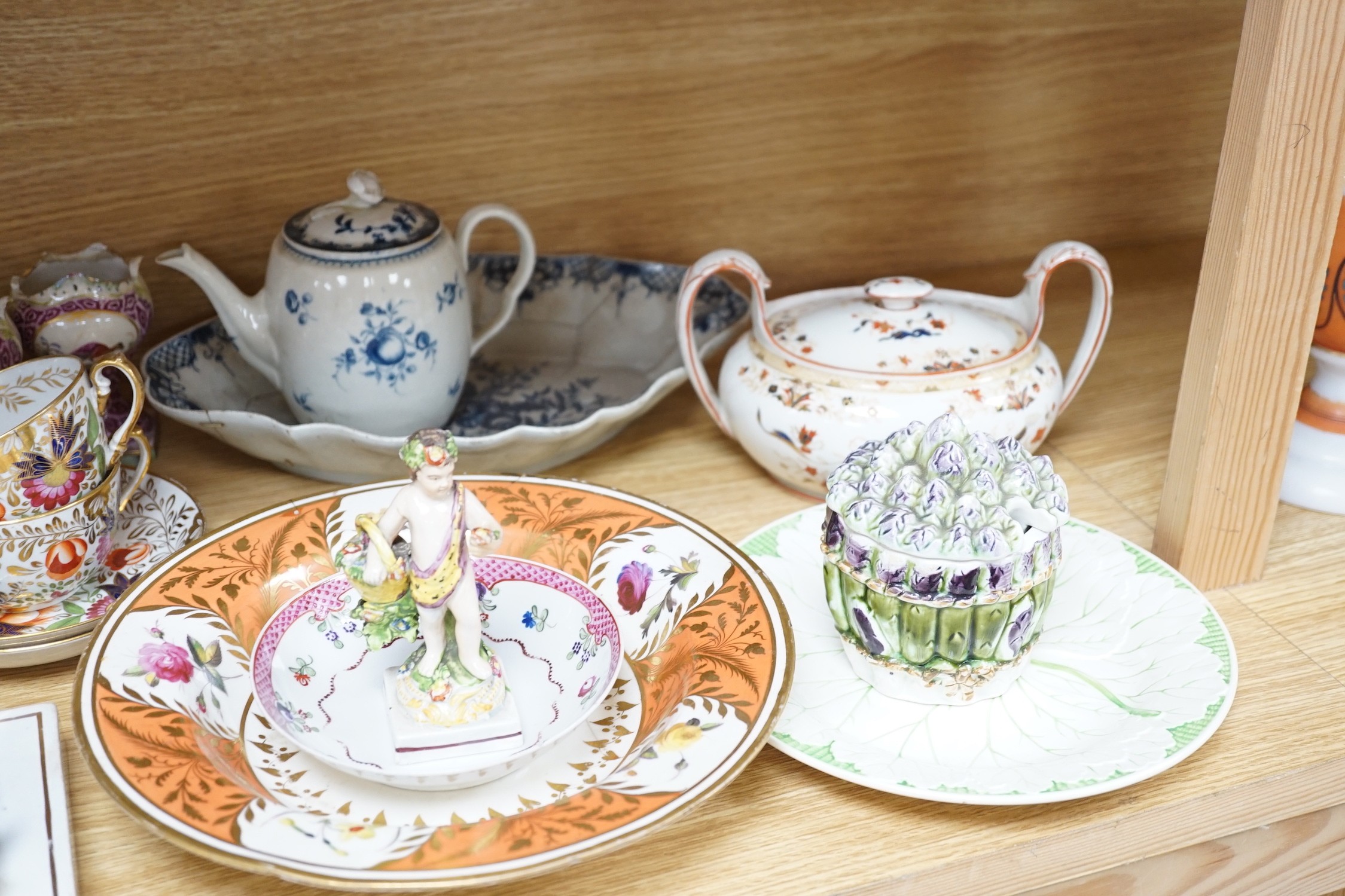 A collection of late 18th/19th century English ceramic teapots, cabinet cups, a jug, dishes and plates etc